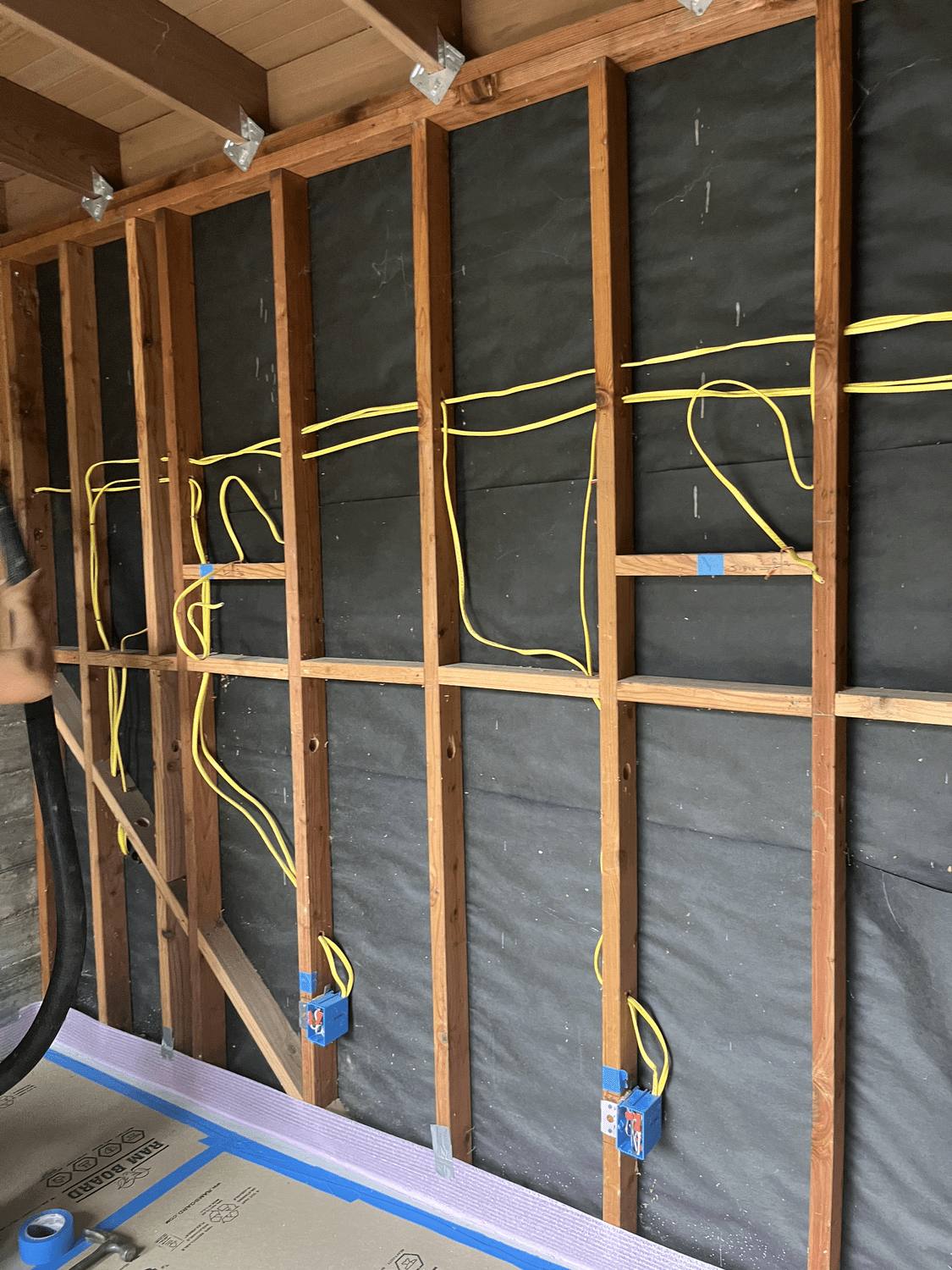 New electrical wiring run through open framing