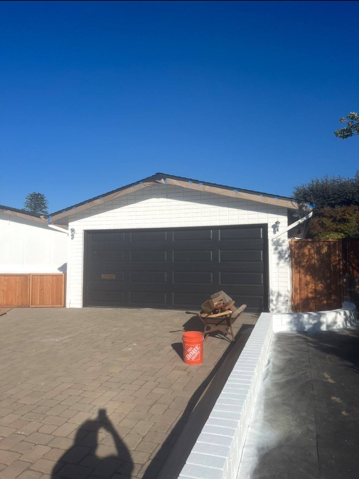 Driveway approach and garage exterior after site work