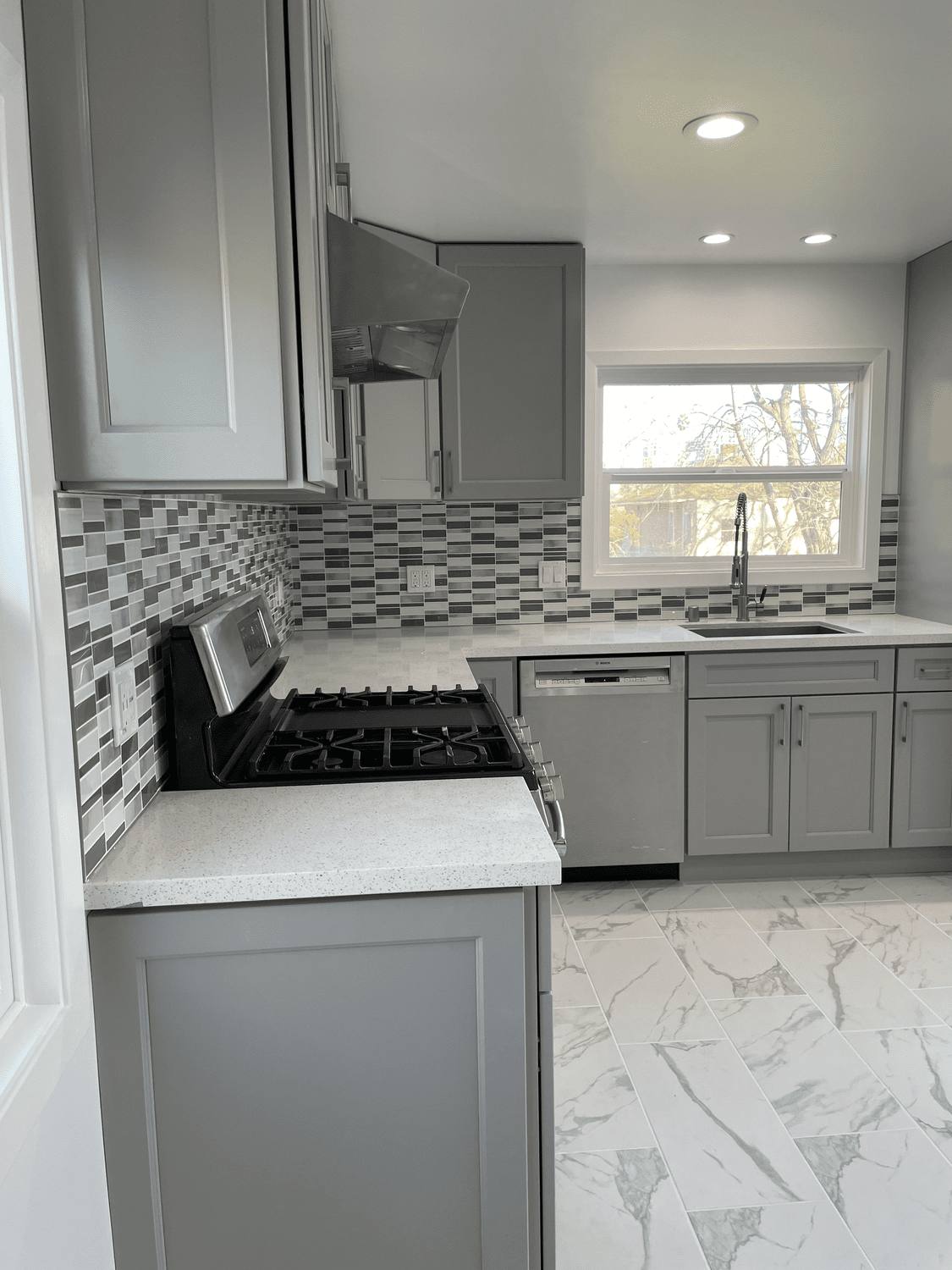 Kitchen flooring installed wall to wall with clean transitions